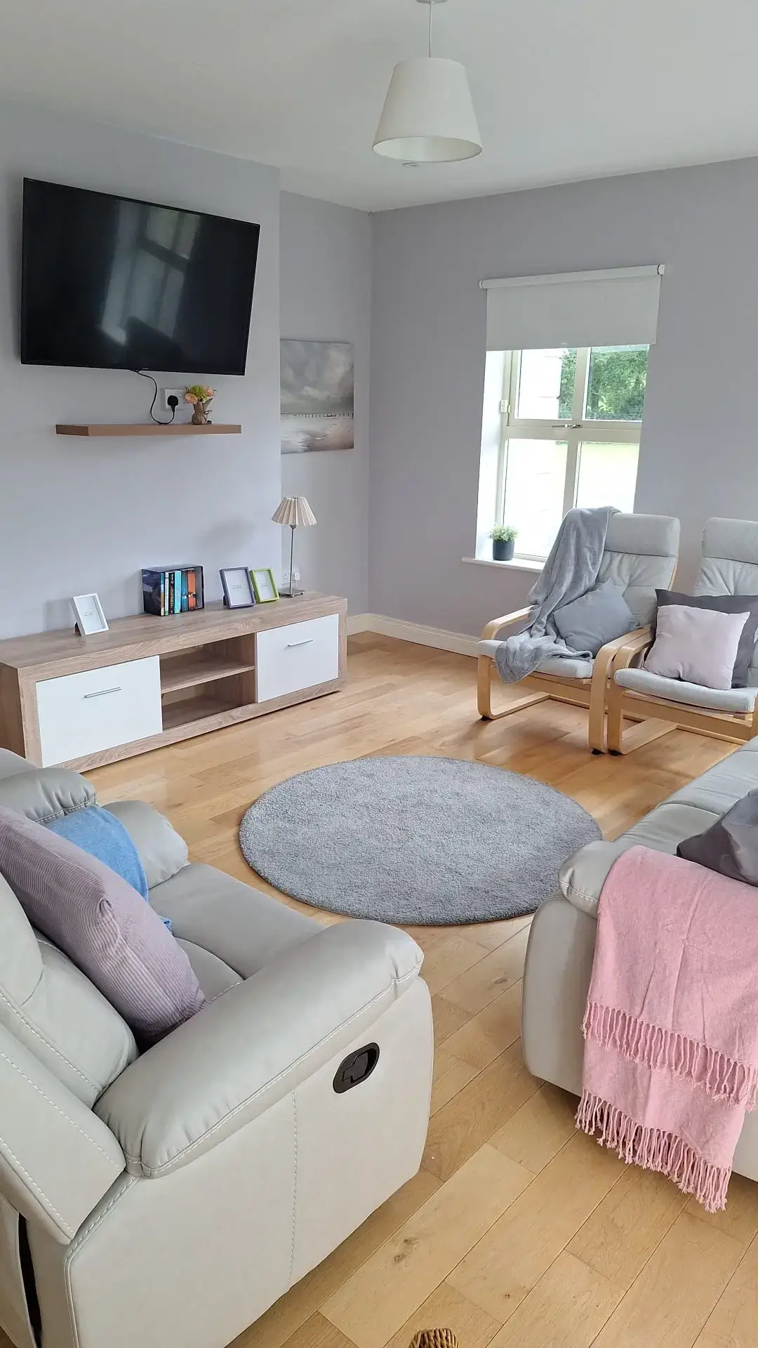 Living room refresh with professional interior painting service, showing quality finish by MS Partners